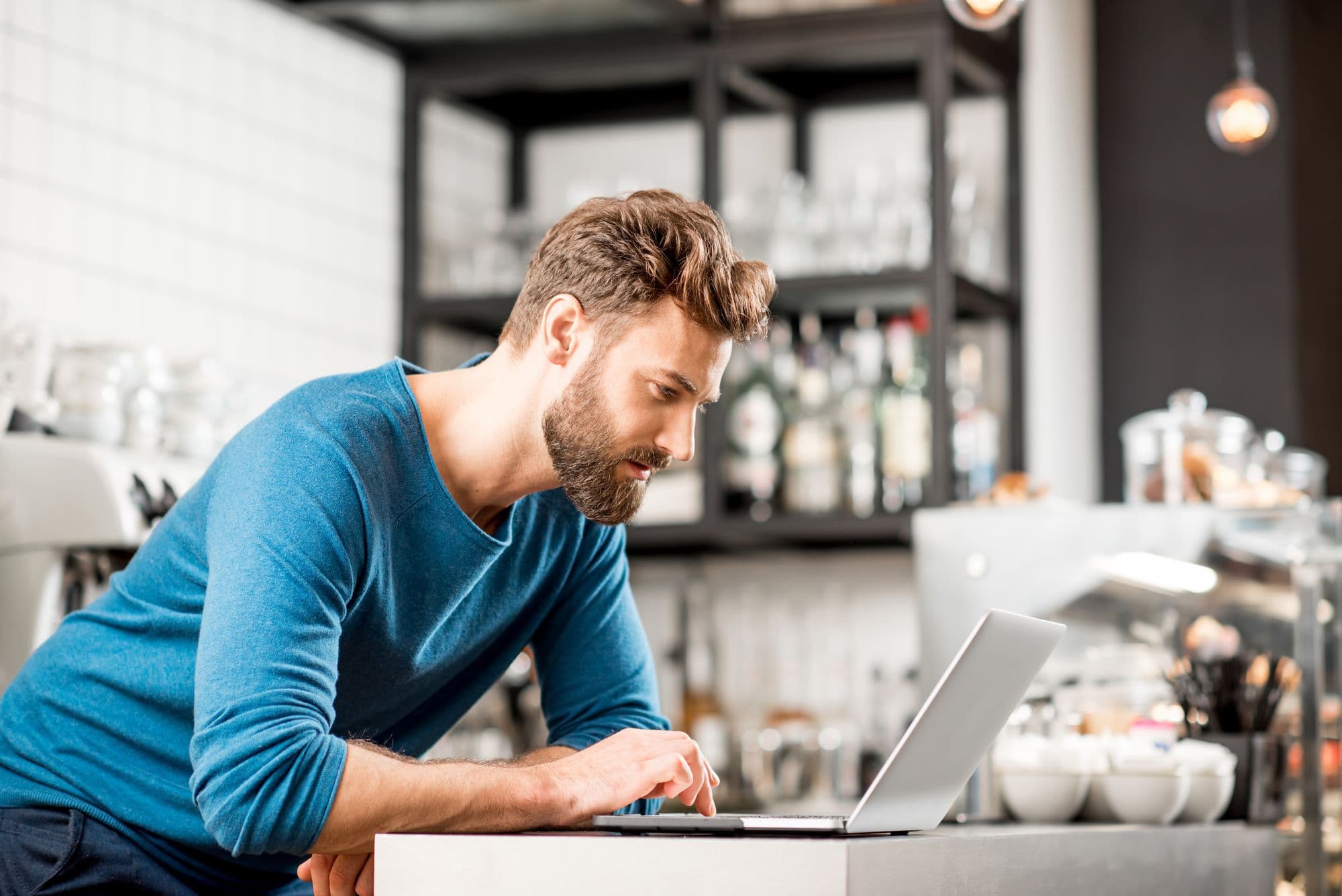 entrepreneur managing his online business