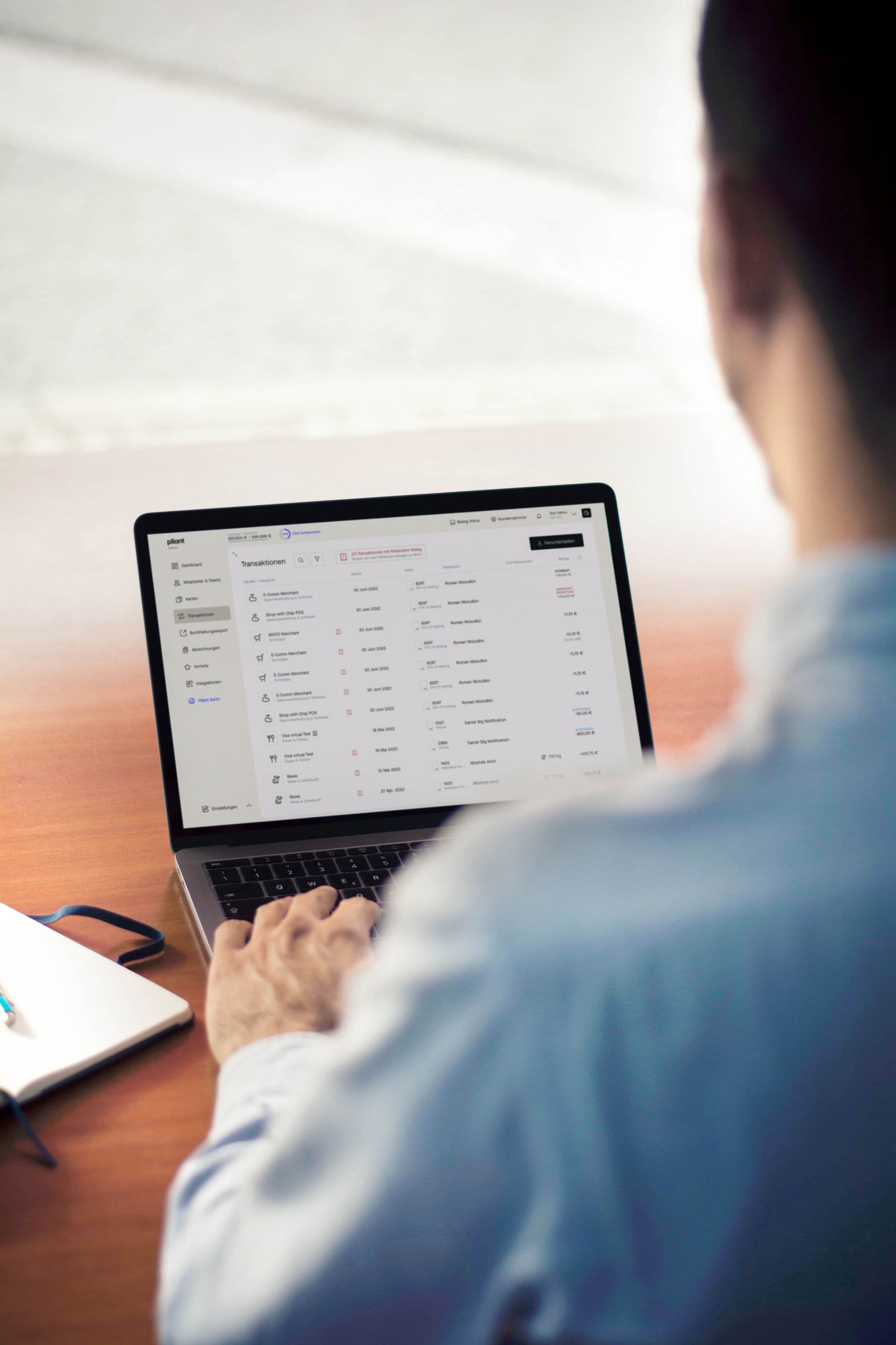 Business man using the Pliant app to track expenses