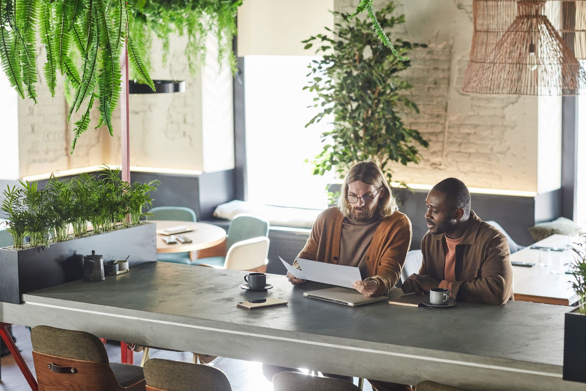 two men working at a marketing agency