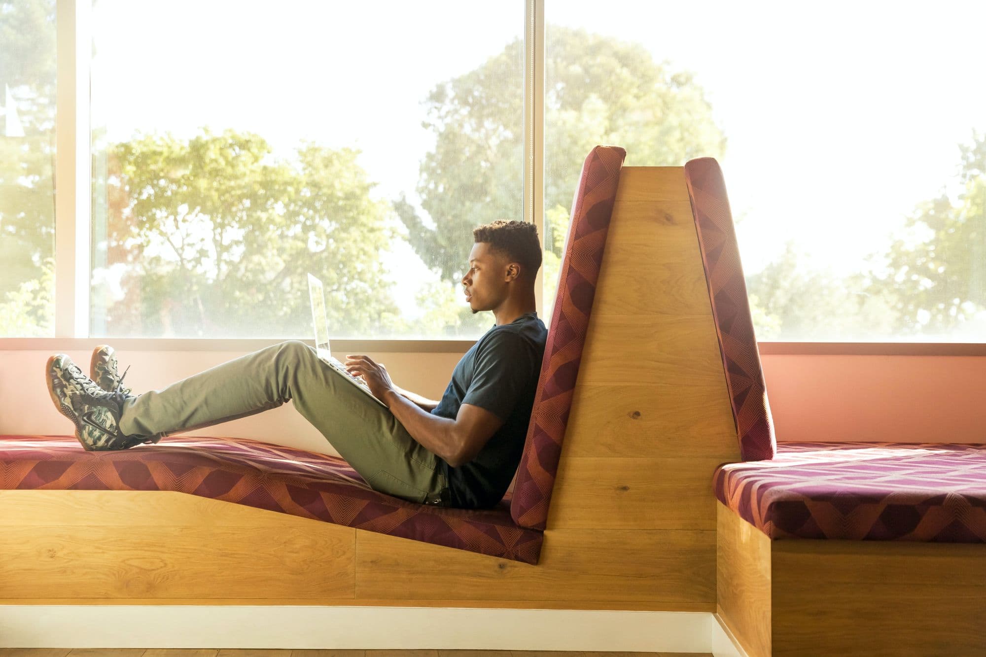 Man writing on a laptop